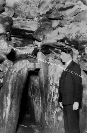 NEWGRANGE INTERIOR  ENTRANCE PASSAGE FROM NORTH CHAMBER THE MAIN IS 6FT 2